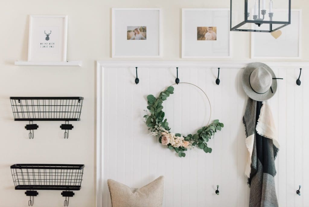 Simple fall decorating idea - a floral hoop in the front entrance adds a pretty and natural touch 