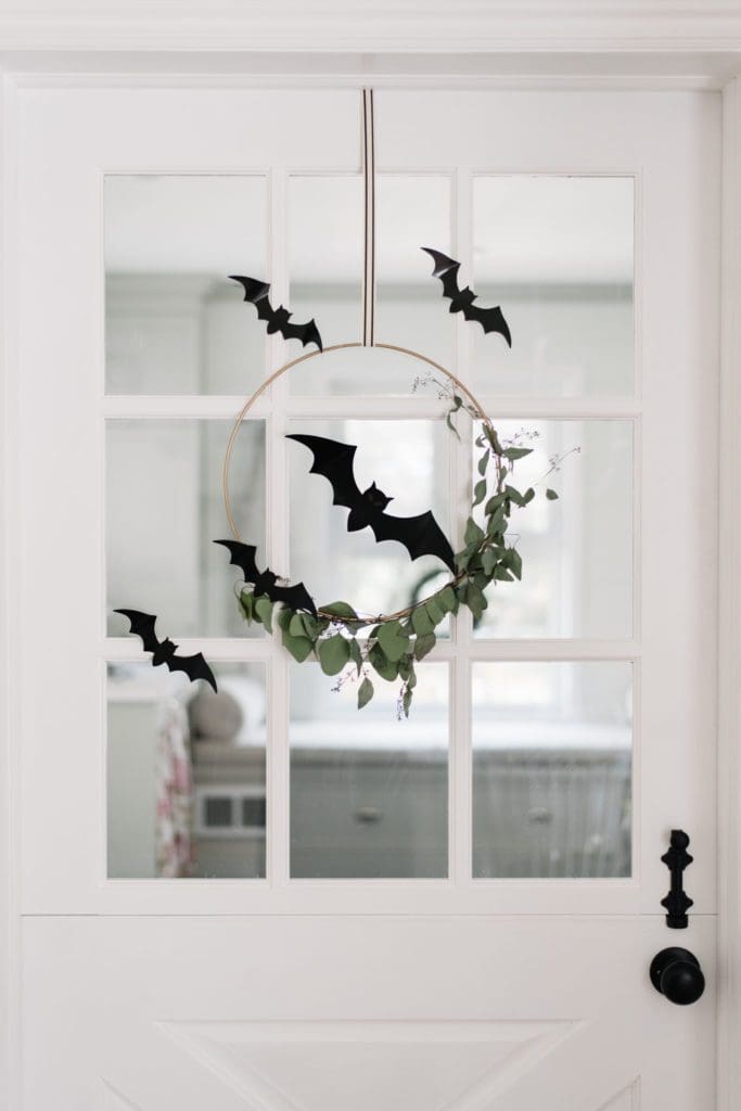 Black bats turn a floral hoop creepy for Halloween