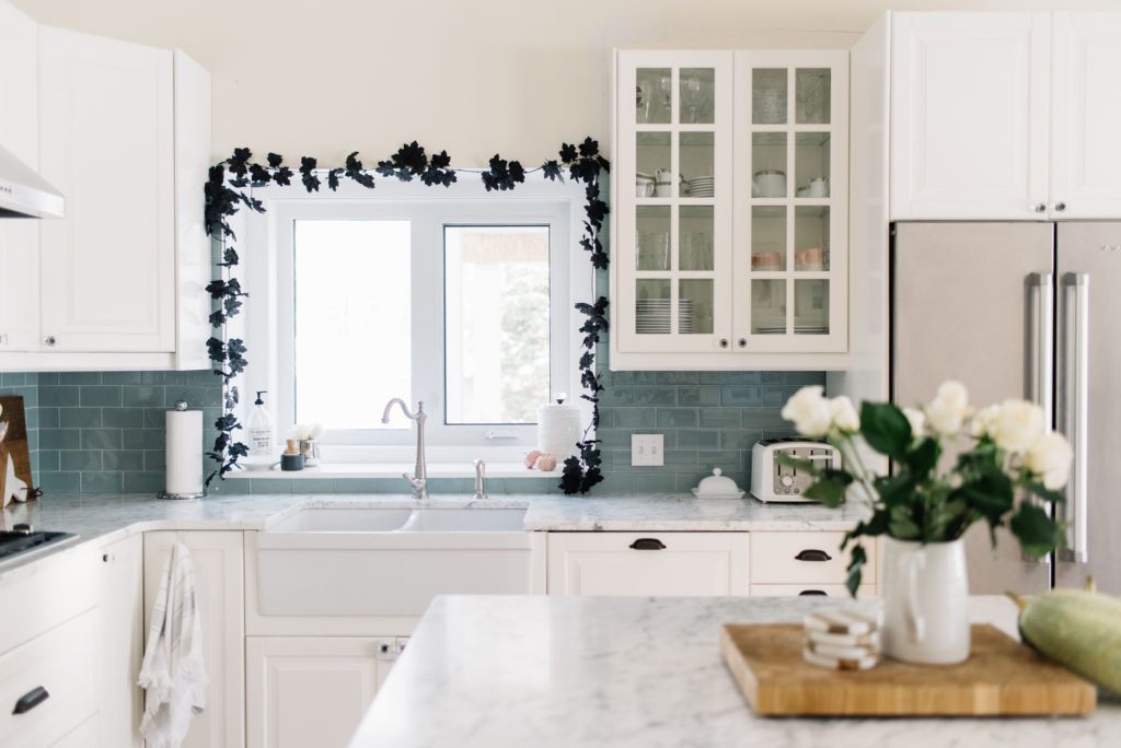 Simple black garland looks luxe in the kitchen for Halloween
