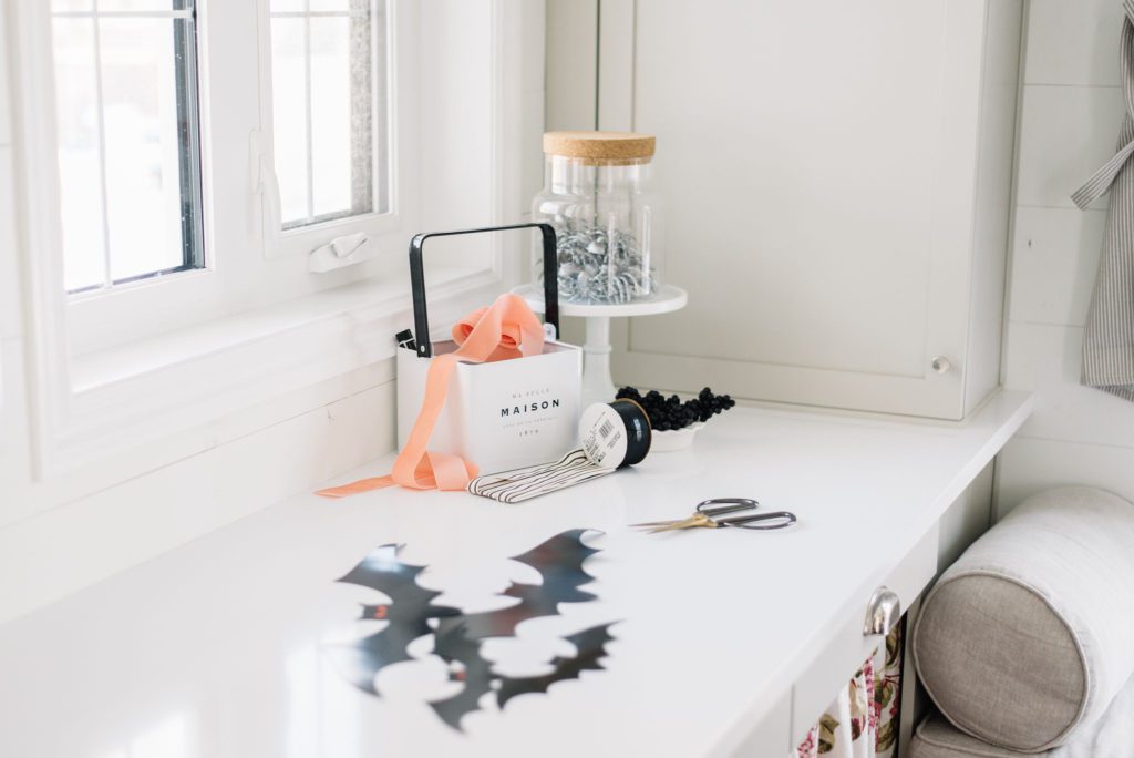 Paper bats from the dollar store make easy and inexpensive decor for Halloween 