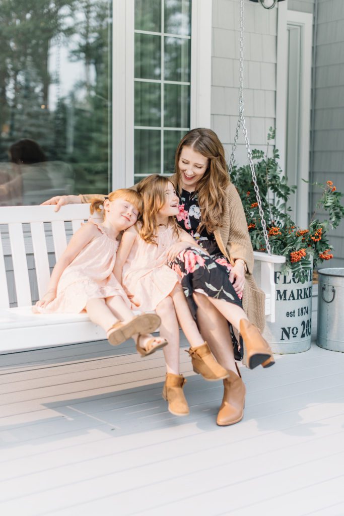 Front porch swings are perfect for family snuggles at The Ginger Home