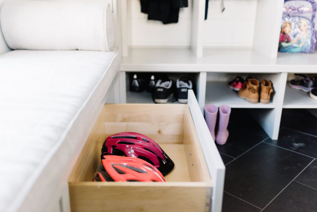 Drawers in the mudroom store bike helmets and add needed storage at The Ginger Home