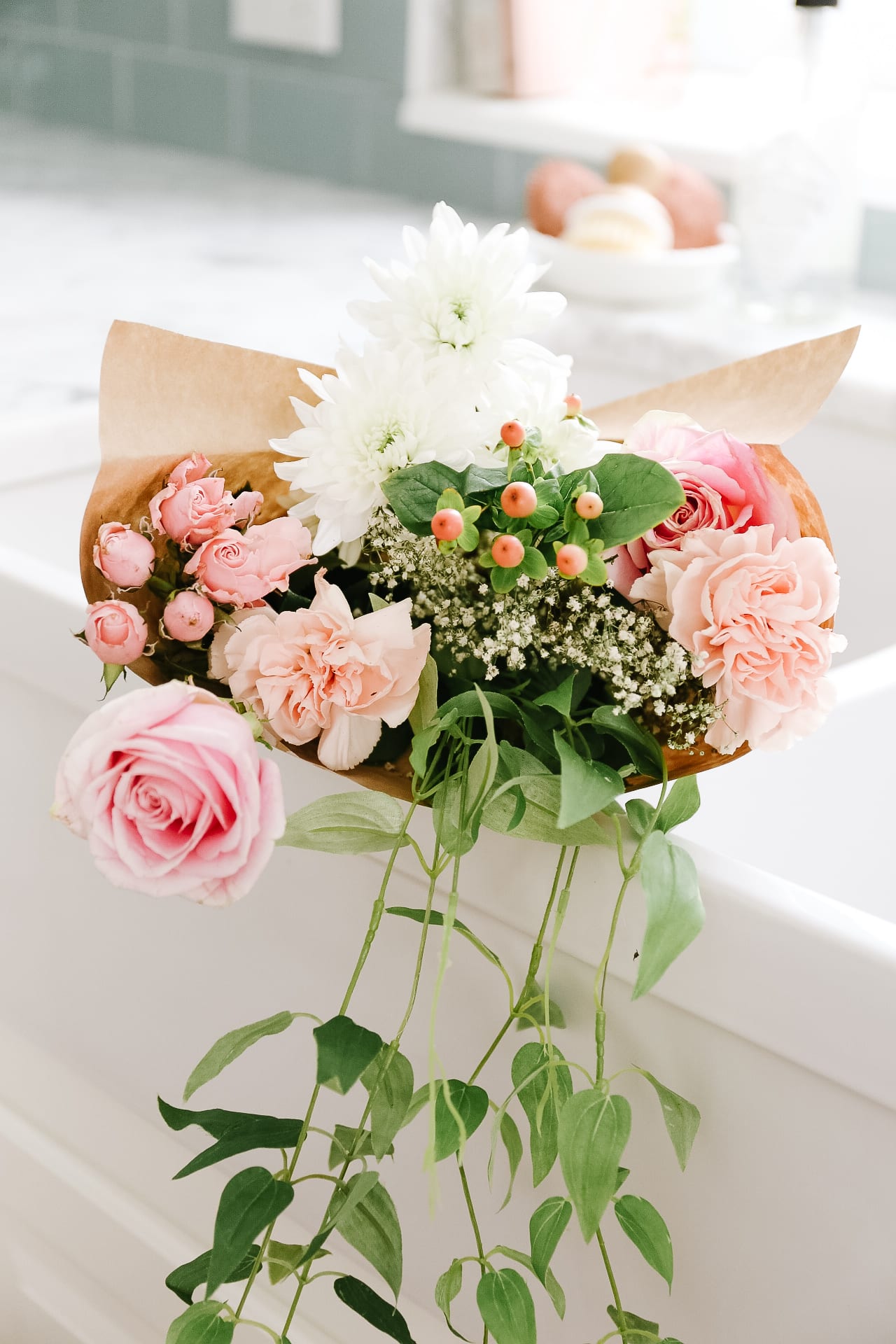 A bouquet of flowers in a sink