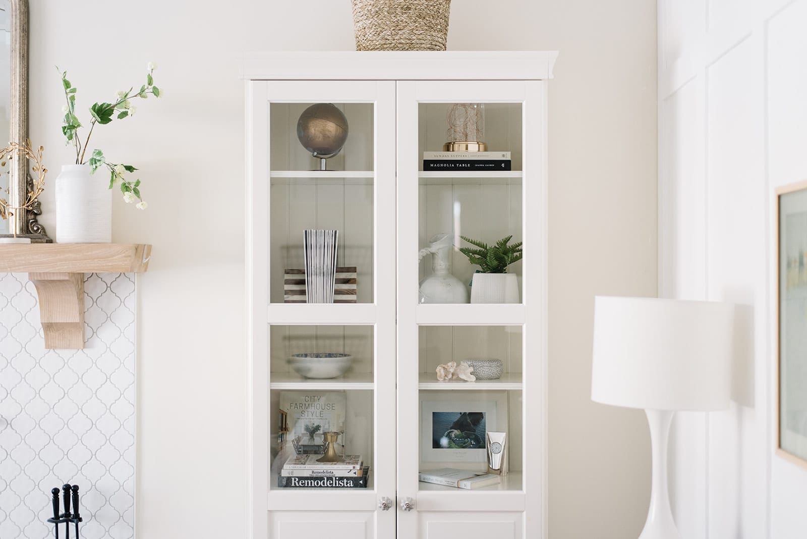 white bookcase with glass doors