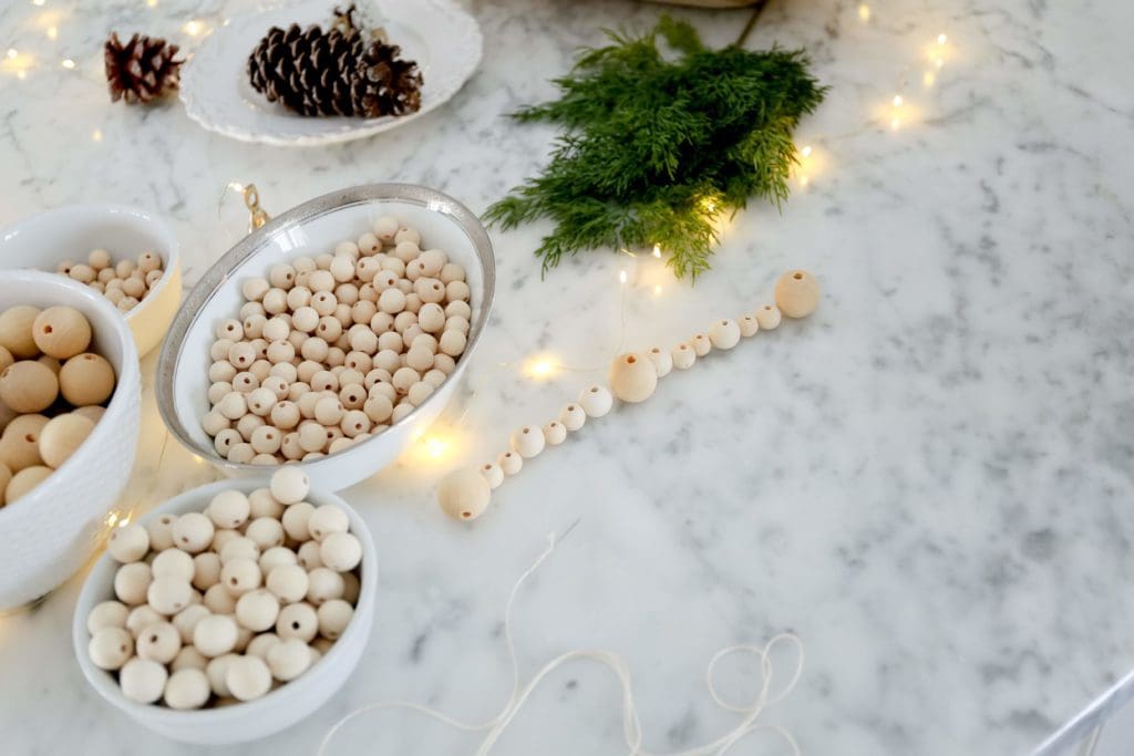 Making wooden bead garlands