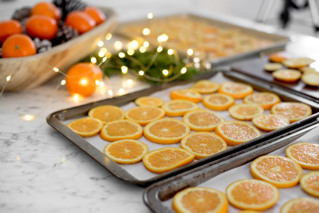 fresh orange slices on baking trays