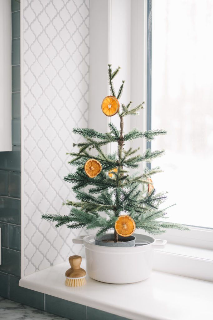 mini Christmas tree with dried orange ornaments