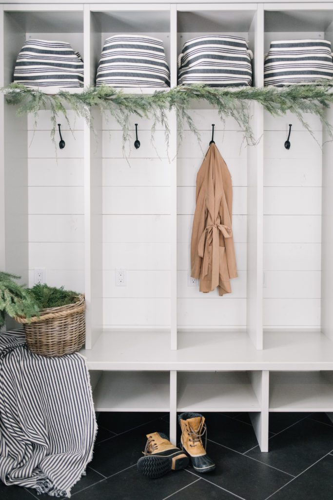 Farmhouse mudroom with Holiday greenery