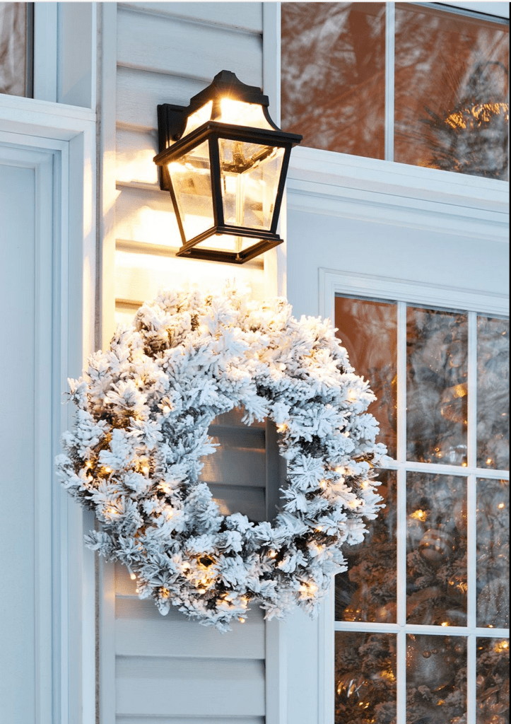 A lit wreath adds sparkle and is a  festive touch during the holidays!