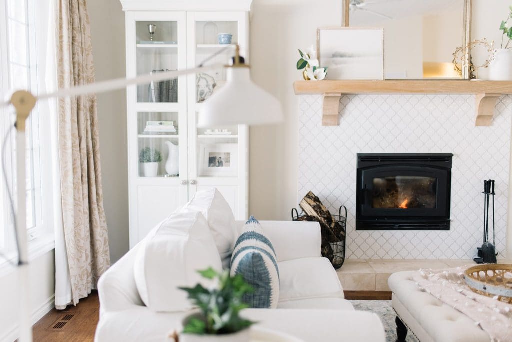 light bright living room with white furniture