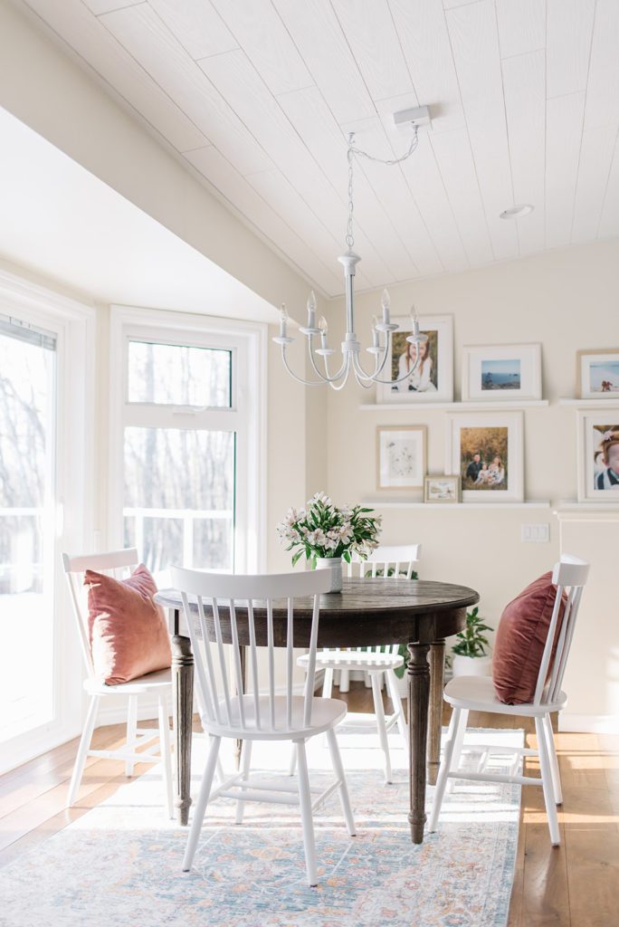 Dining room with white chandelier