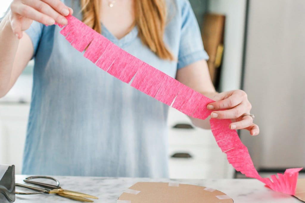 a long piece of streamer cut into strips