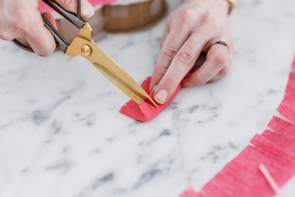 cutting streamer with scissors