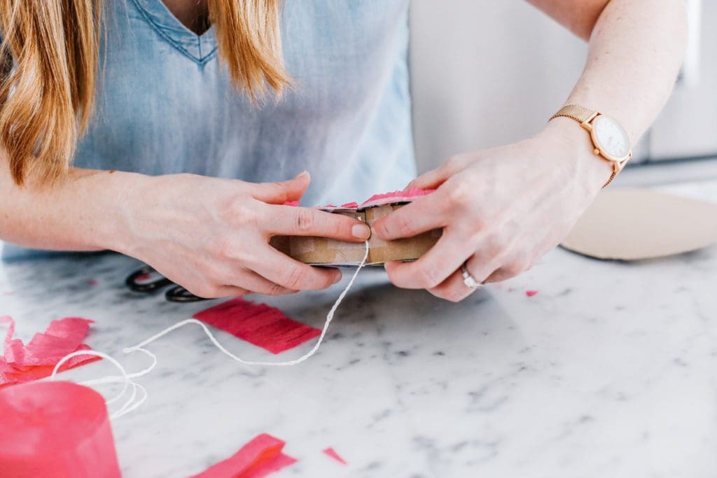 adding string to hang a heart pinata