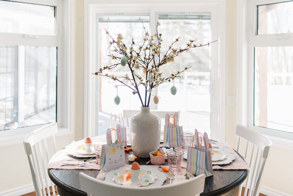 An Easter tree made from pussy willows and hanging Easter eggs