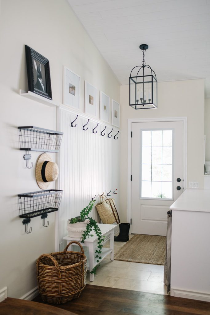 entryway with bench, hooks and baskets