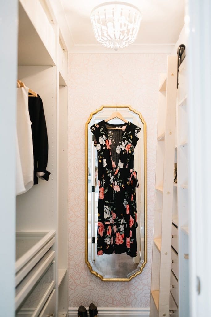 dress hanging on mirror