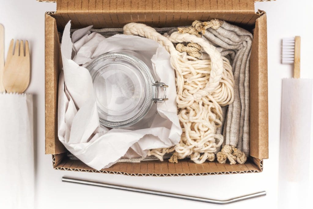 box of green kitchen goods