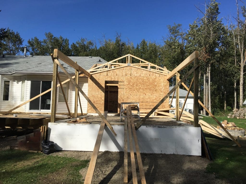 large sun room addition being built
