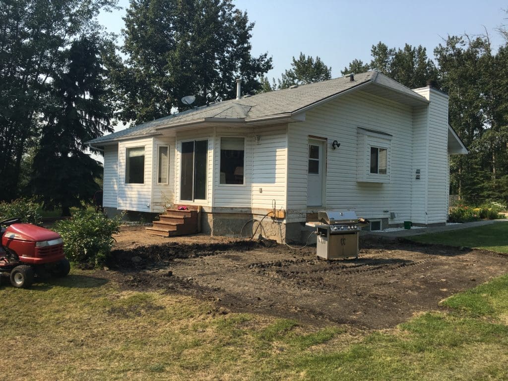 small white bungalow ready for addition
