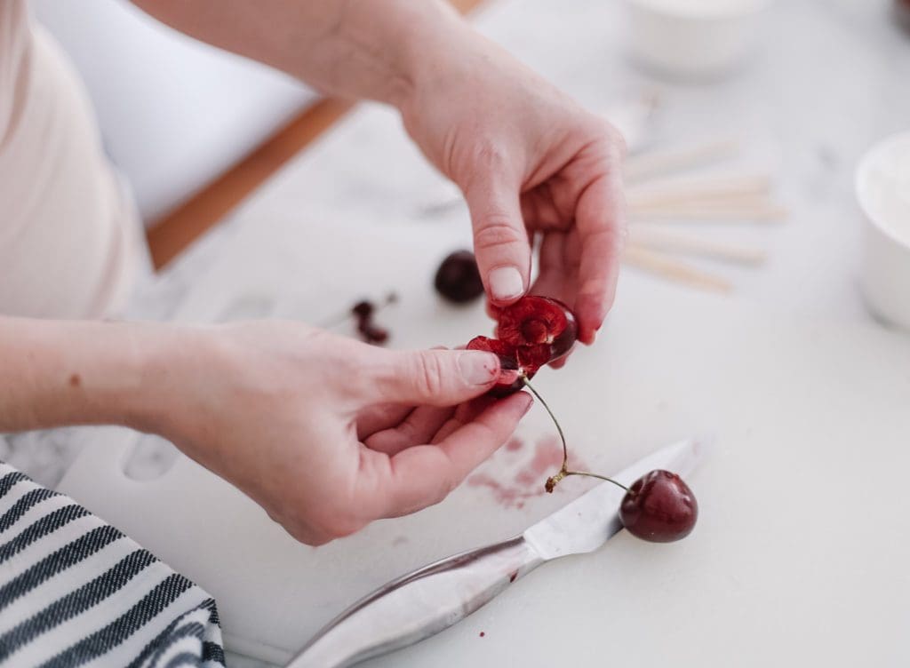 pitting fresh cherries