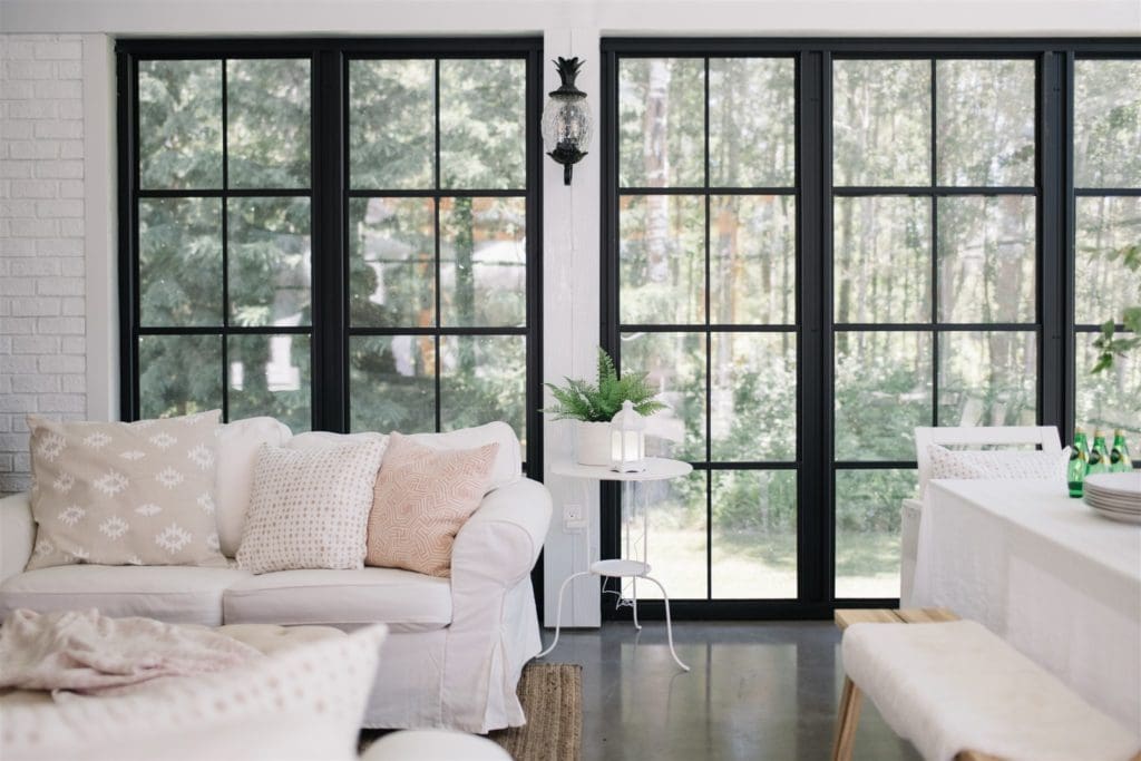 sofa and side table in a sun room