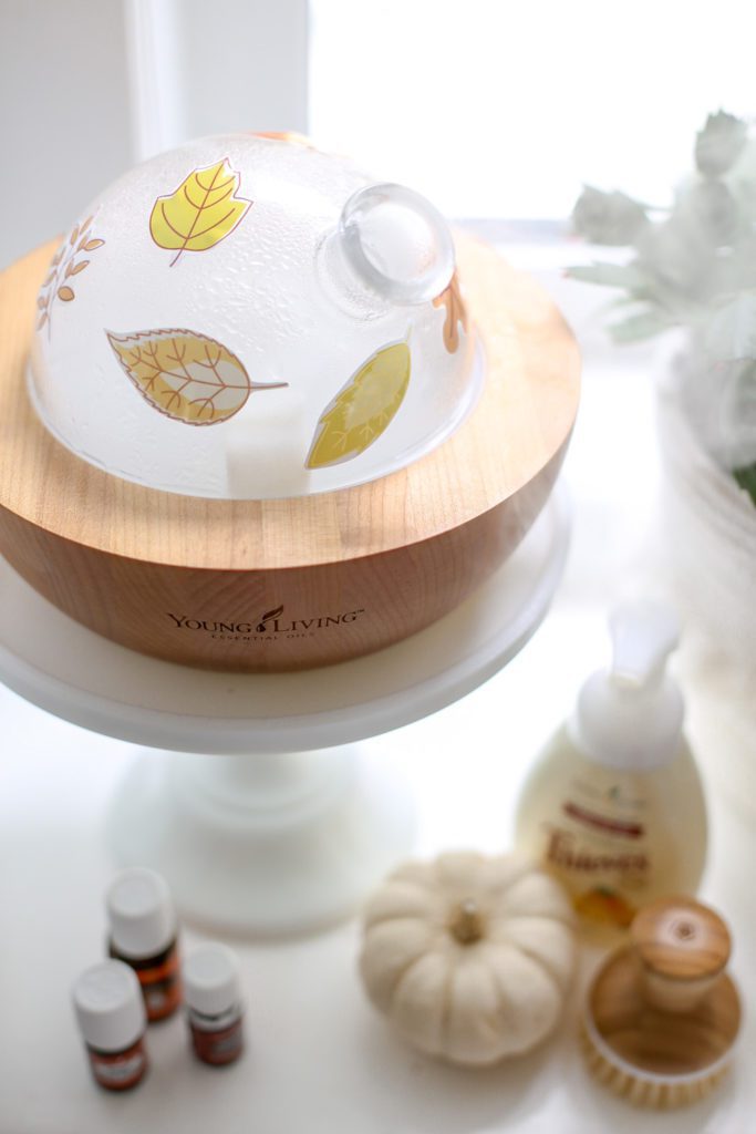 Free printable fall leaf pattern stickers on a Young Living Aria diffuser.
