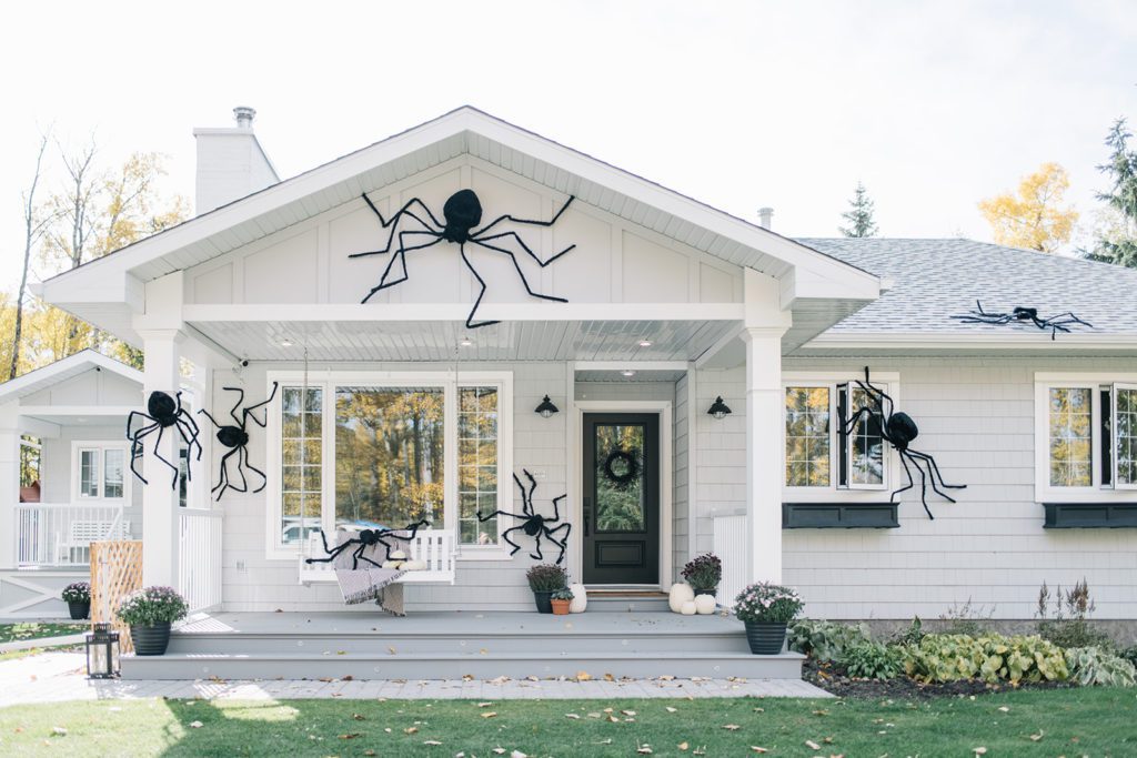giant spiders on house for Halloween