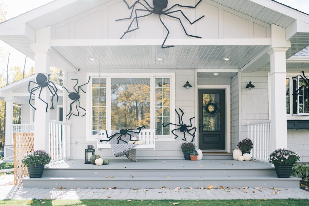 giant Halloween spiders on front porch