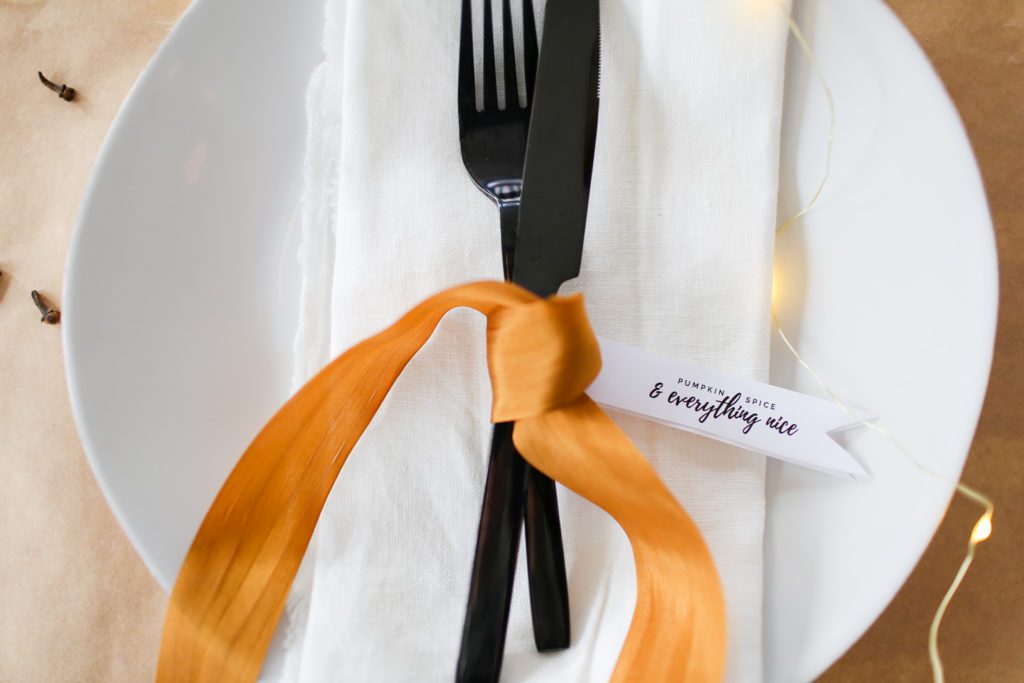 silk ribbon tying thanksgiving tag to cutlery