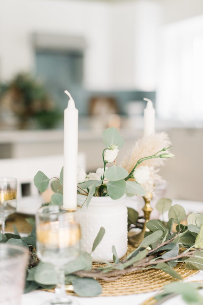 white candles and florals