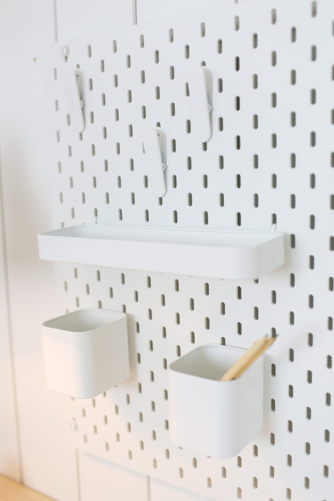 A close up of a pegboard