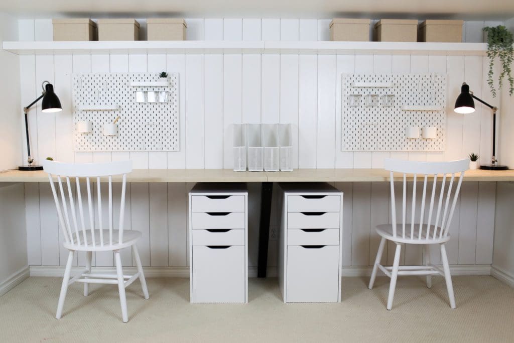 workspace with peg boards, drawers and wooden counters