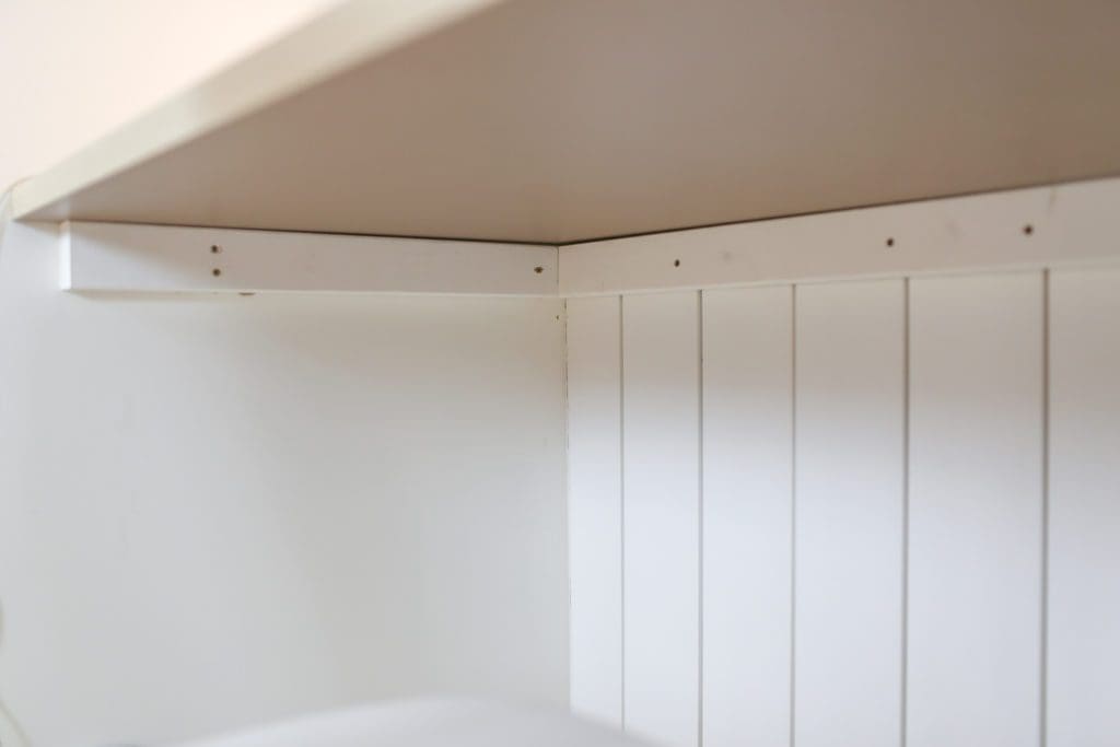 Countertop mounted as desk space, closeup view underneath