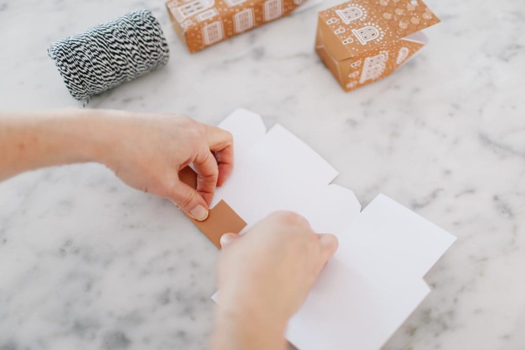 folding a gingerbread house gift box