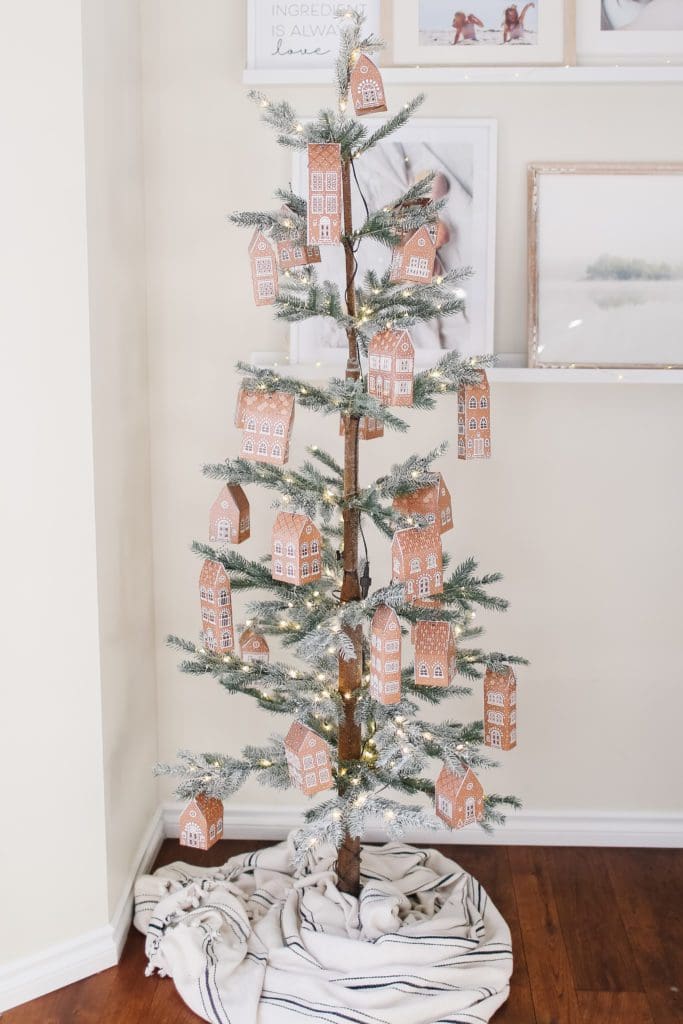 Gingerbread houses hung on a tree