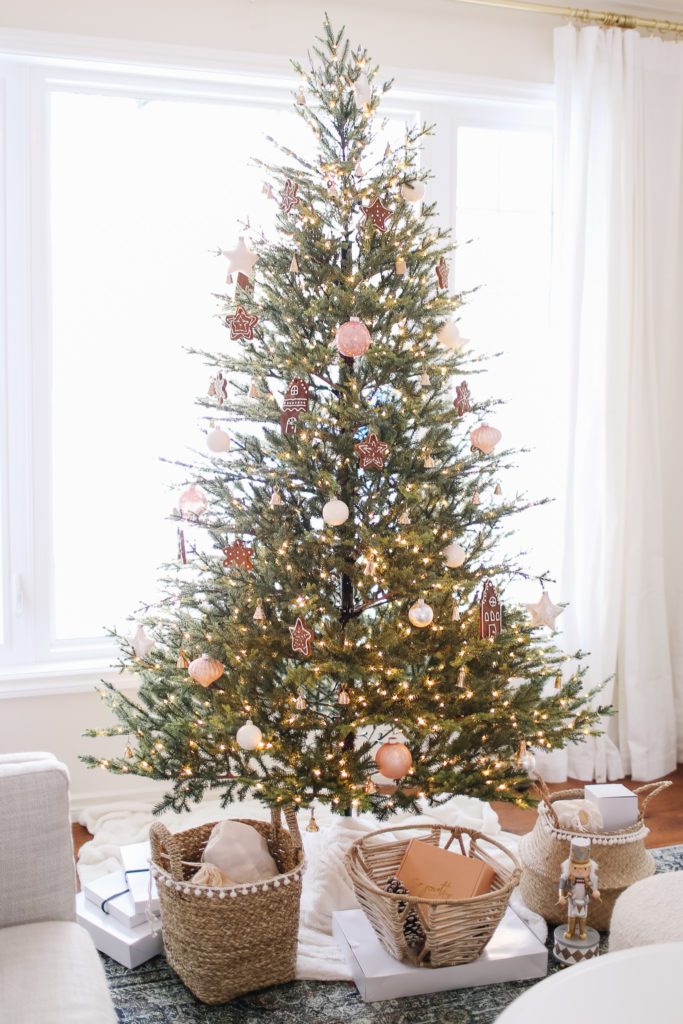 Delicate Christmas tree with pink and white ornaments