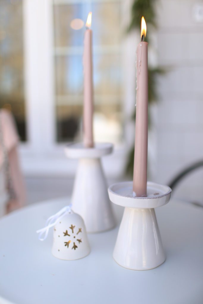 pink candles and white holders