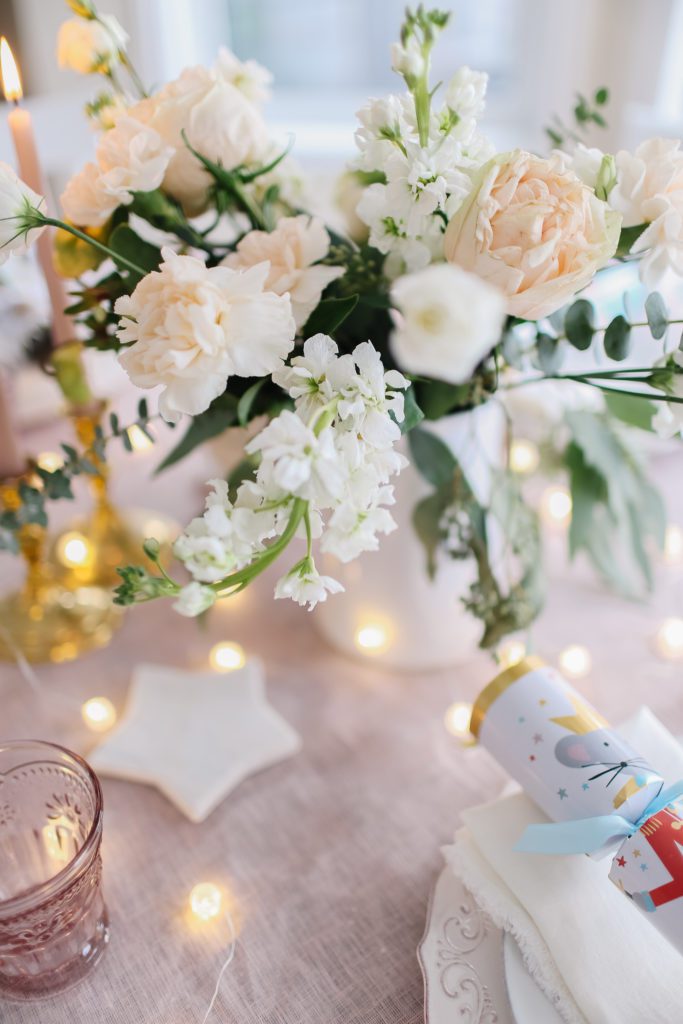 Blush and white flowers and a marble star coaster