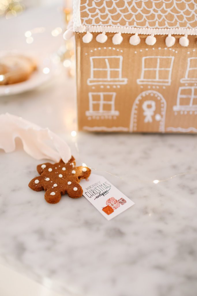 gingerbread gift tag on a marble counter
