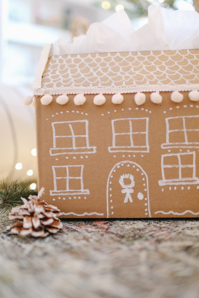 hand made gift box that looks like a gingerbread house
