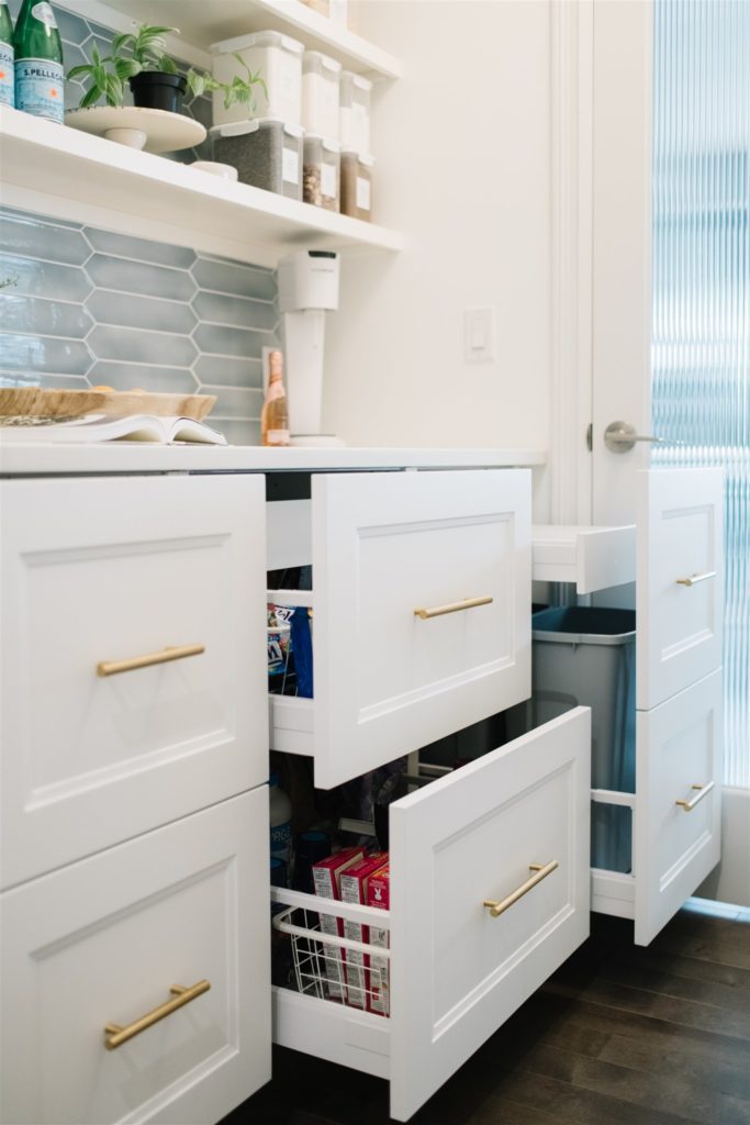 open drawers in built in pantry storage space