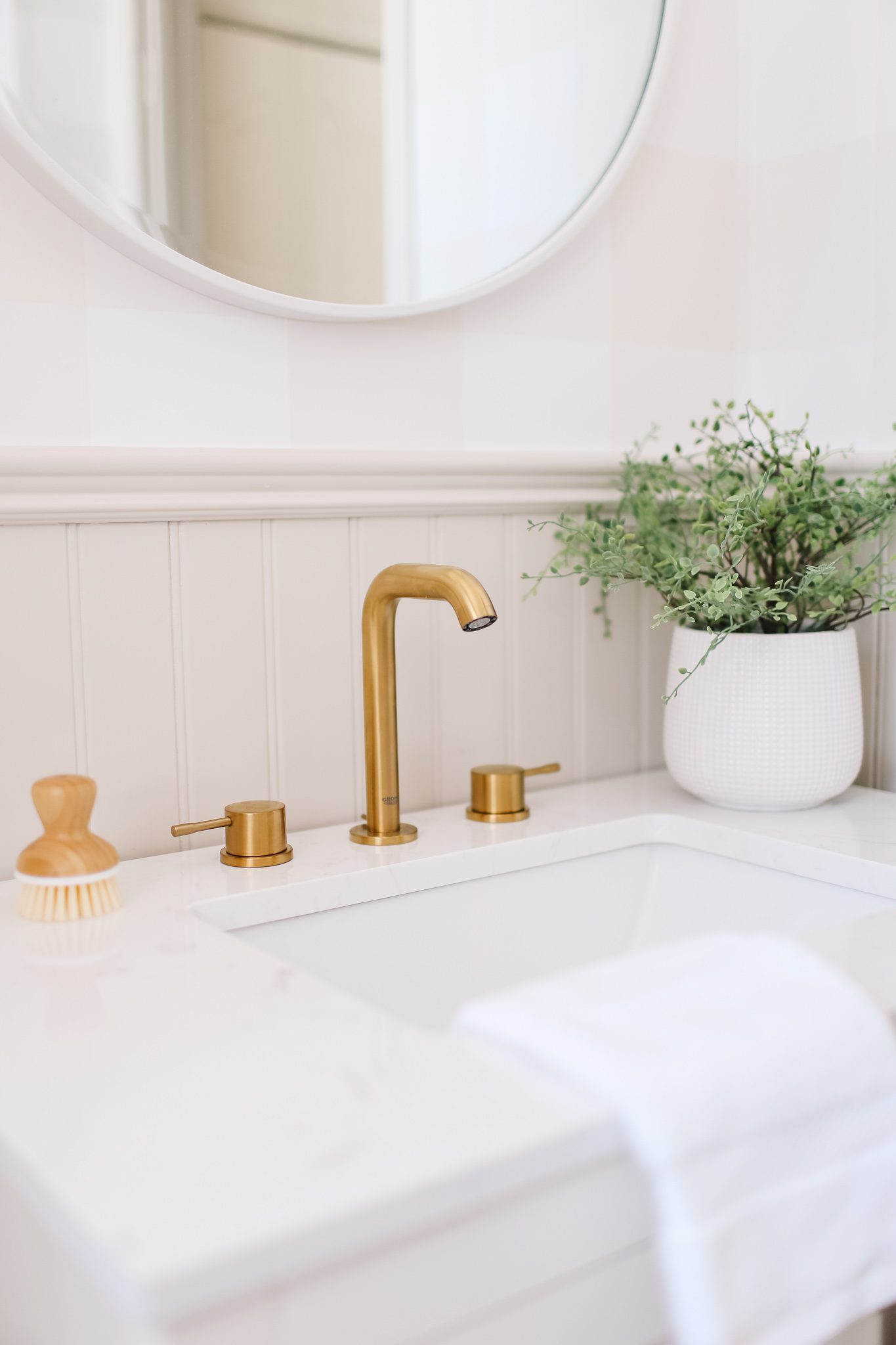 A gold bathroom faucet