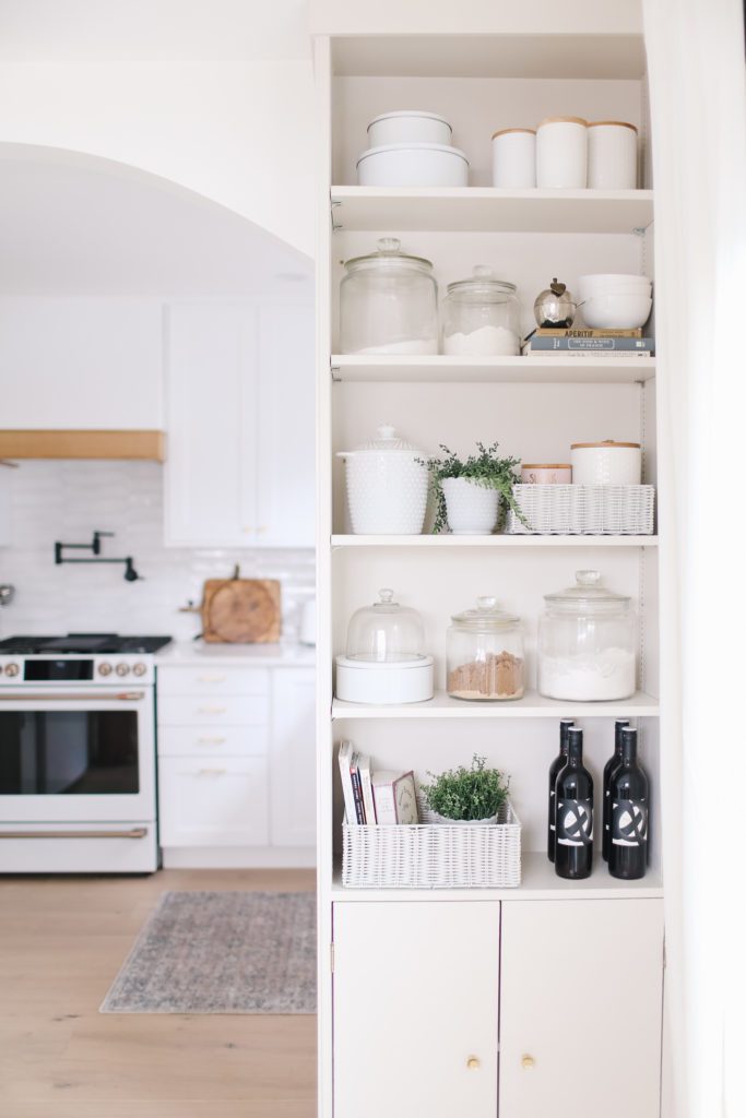 A view of a kitchen shelving