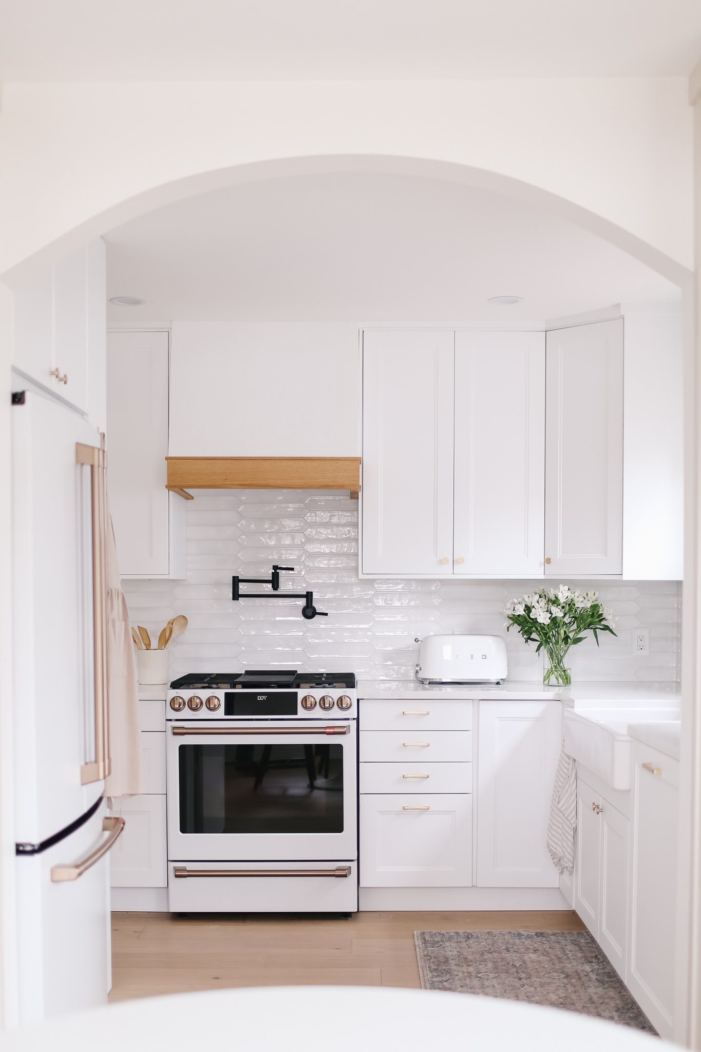 A white kitchen with white Café appliances