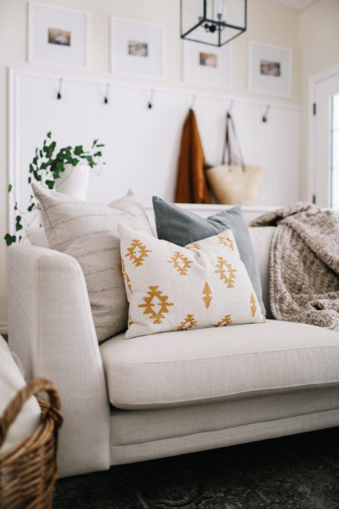 Colorful Throw Pillows and blankets on a couch